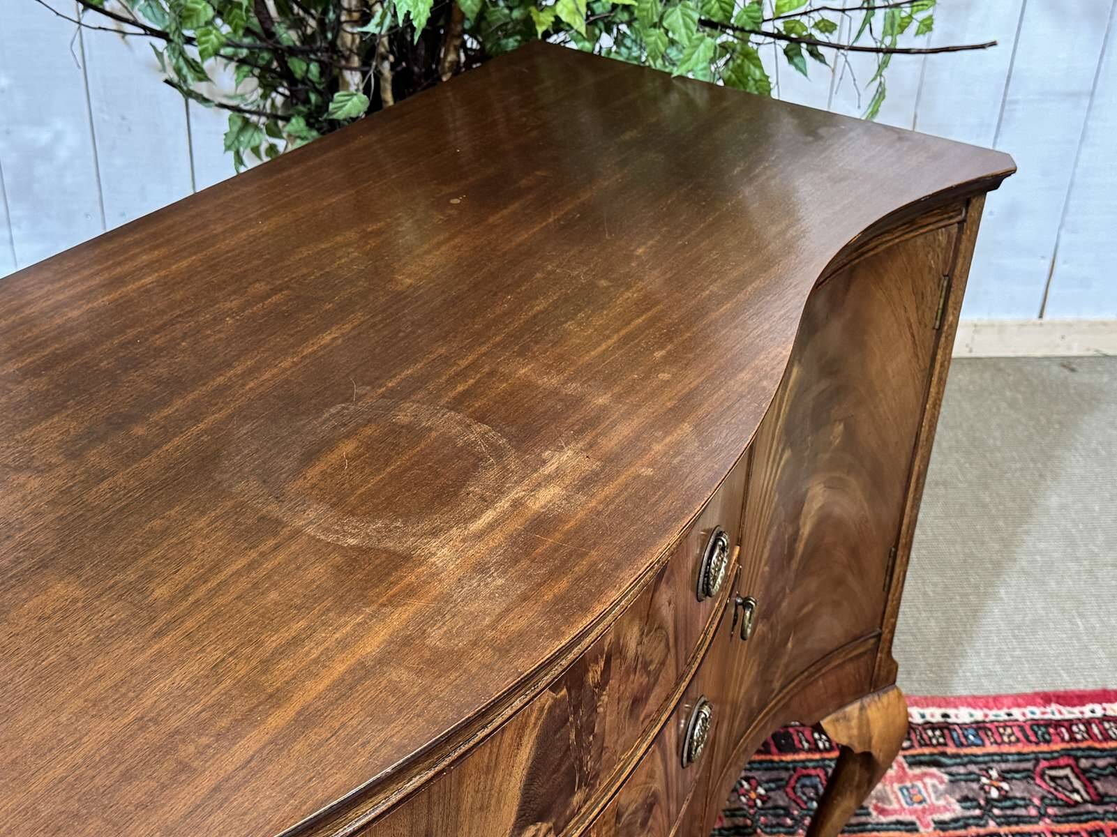 English Chippendale mahogany enfilade from the 1930s.