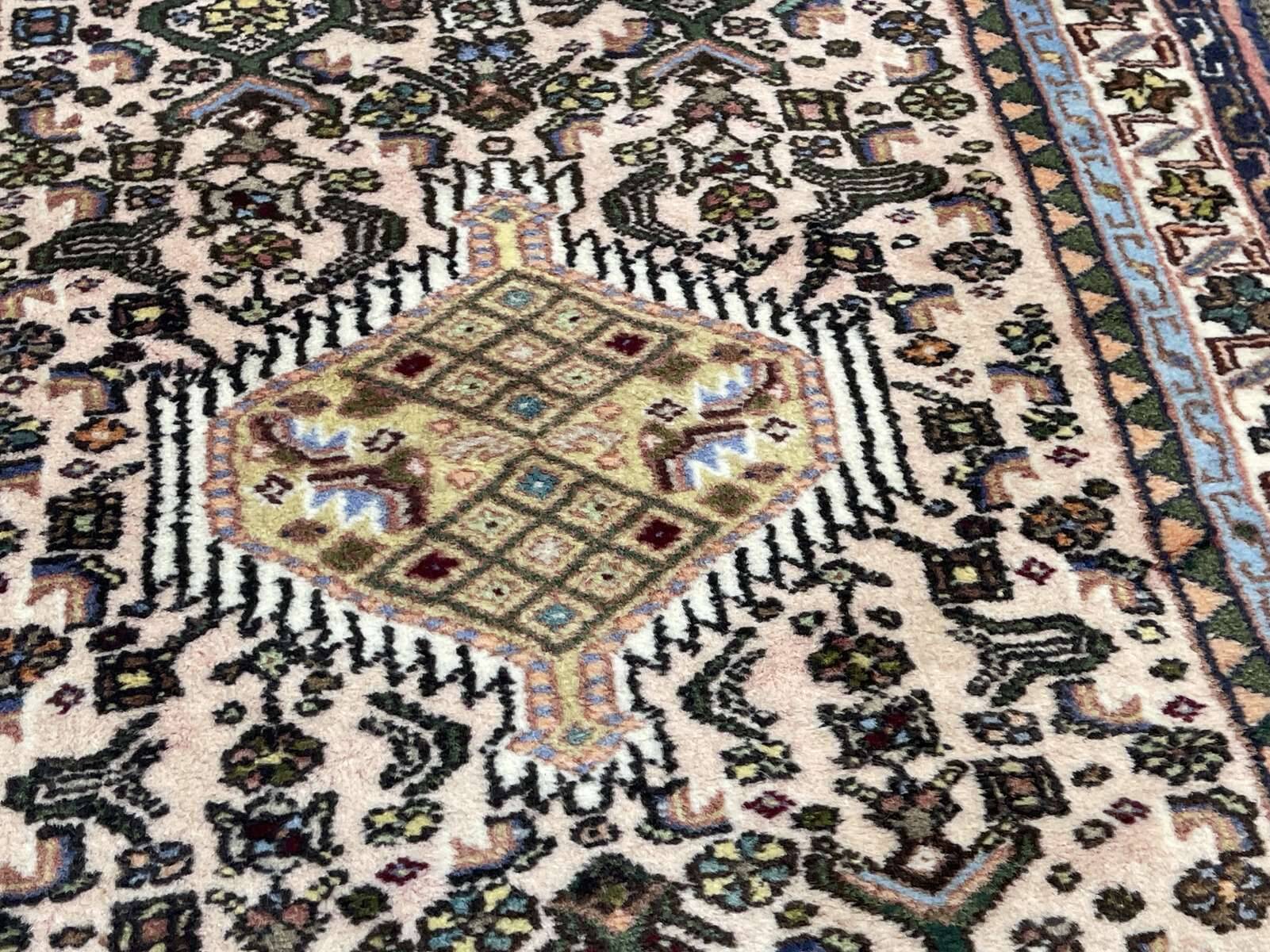 Handmade wool Iranian rug - 1.25m x 0.75m