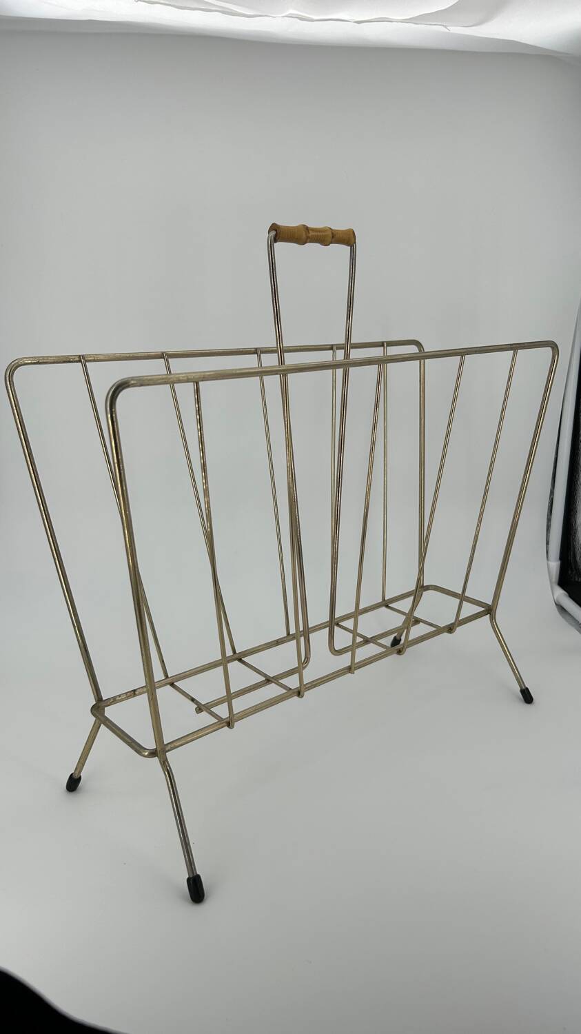 Vintage gold metal magazine rack