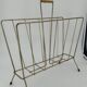 Vintage gold metal magazine rack