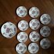 Set of 11 dessert plates and an English ceramic dish