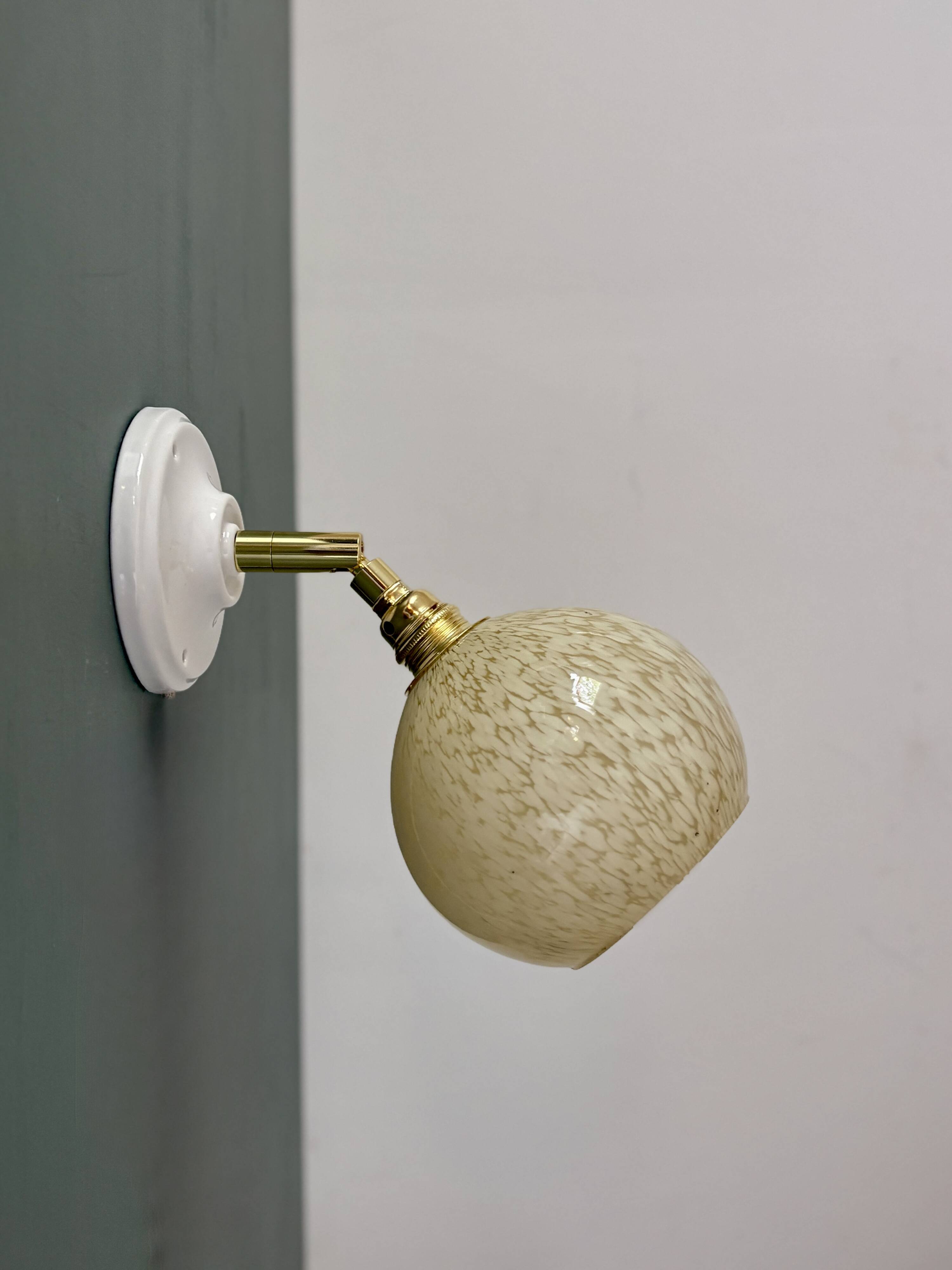 Vintage glass globe wall light in pale yellow from Clichy.