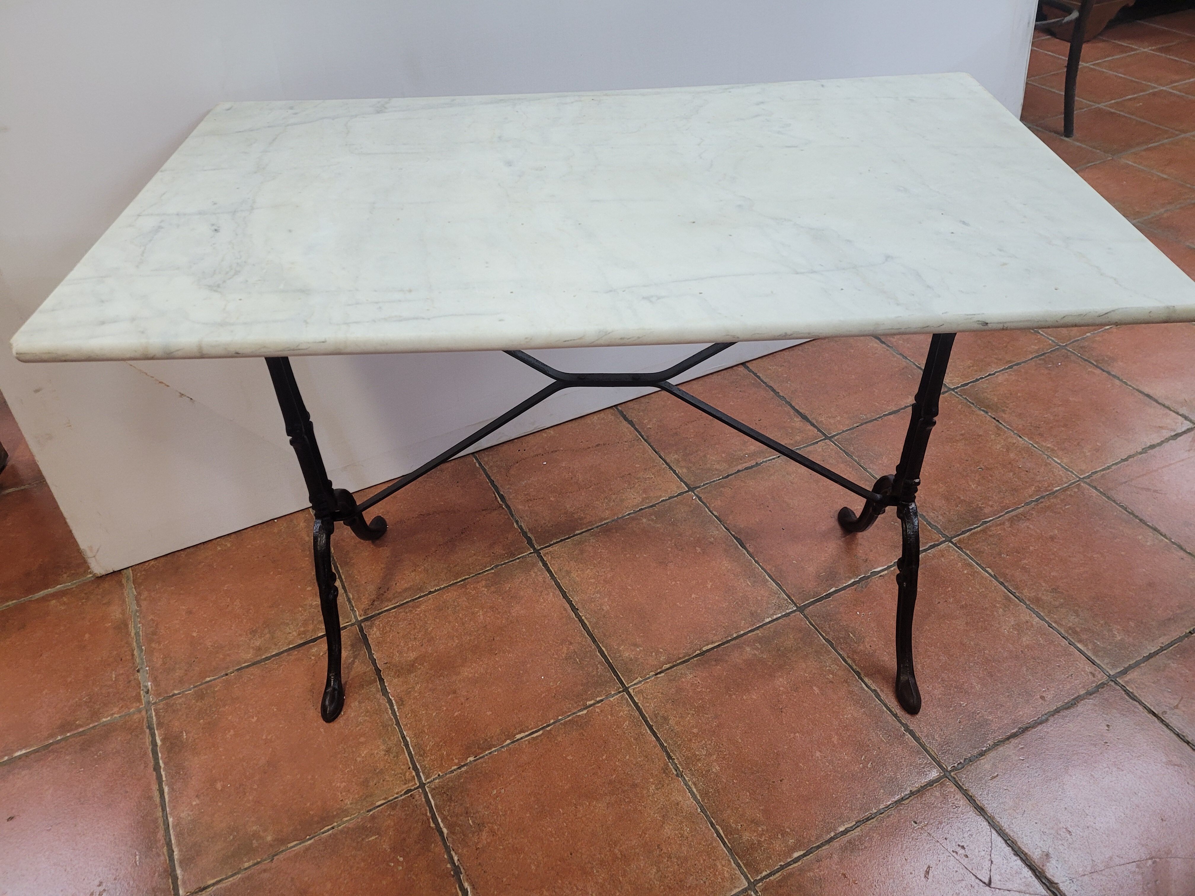 Bistro table base cast iron over marble