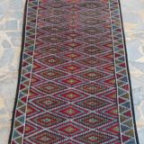 Handmade multicolored diamond patterned kilim rug in natural wool