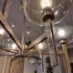 Timeless modern Scandinavian / mid-century chandelier in chrome and smoked glass.