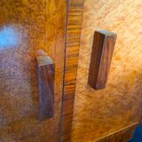 Art Deco cabinet in speckled maple veneer with asymmetrical shelves