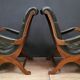 Pair of English Chesterfield armchairs in leather and solid wood