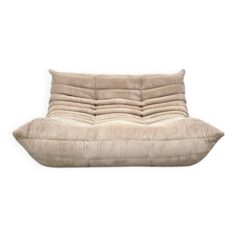Two-seater canapé in beige corduroy attributed to Michel Ducaroy for Ligne Roset, 1970s.