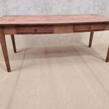 Old farmhouse table with two drawers.