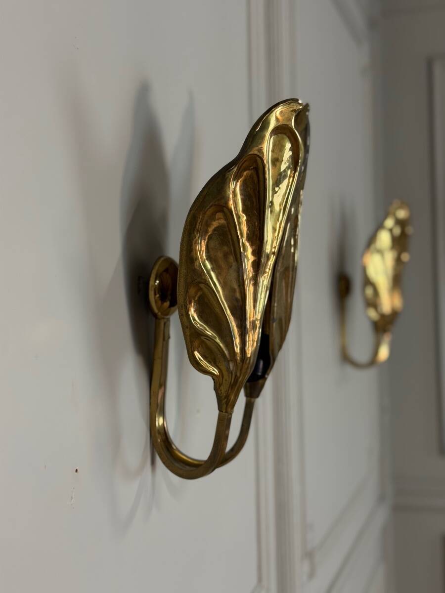 Set of four gilt brass wall lights, Tommaso Barbi, circa 1960.