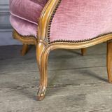 Pair of Louis XV style bergère armchairs in carved wood, pink velvet, circa 1900