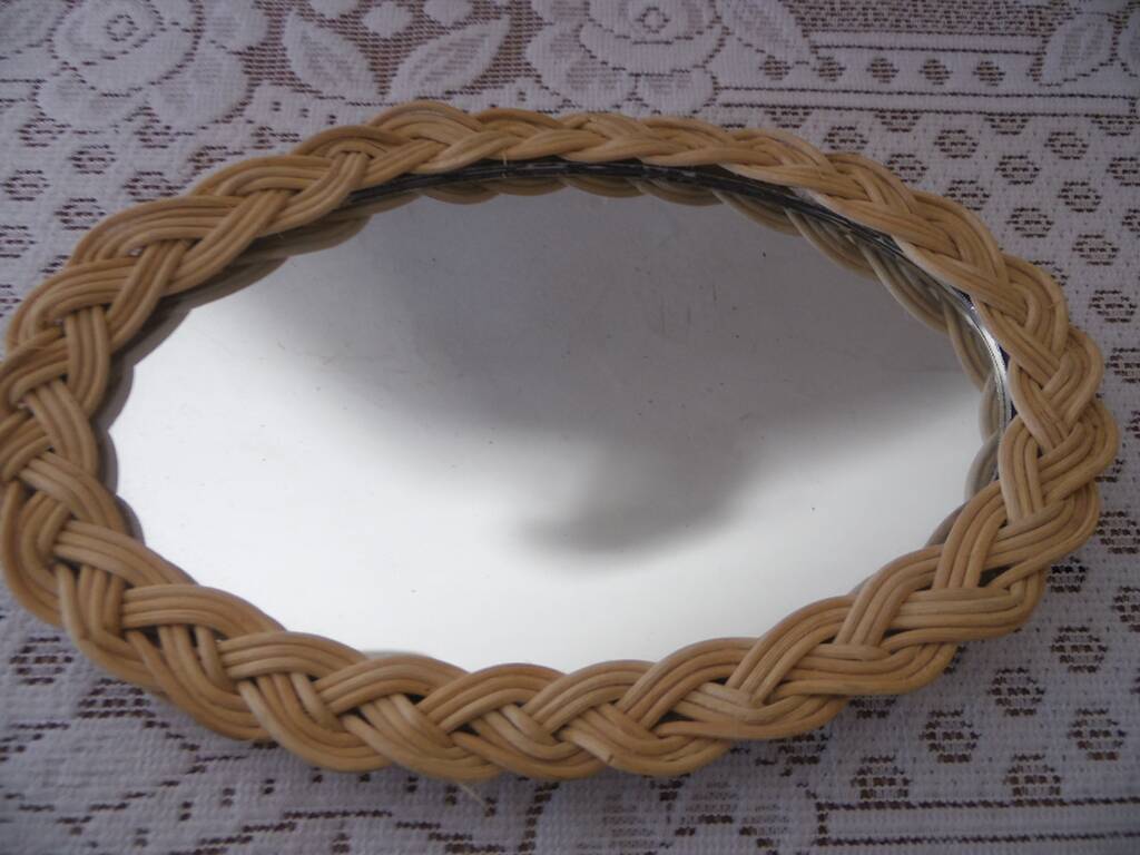 Small oval wicker mirror