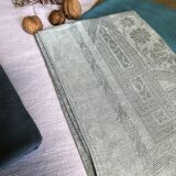 Suite of four tinted antique napkins