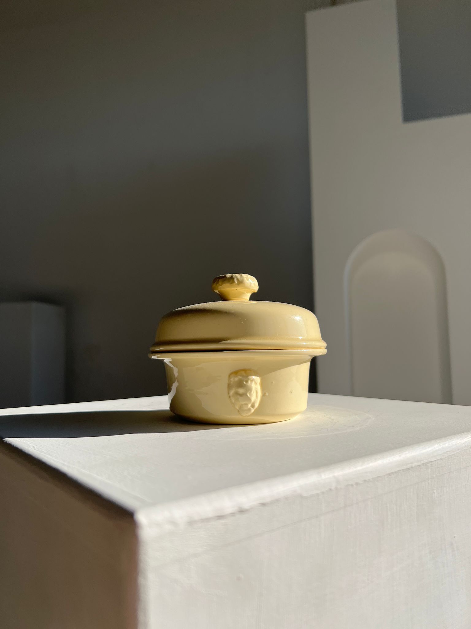 Glazed light yellow ceramic terrine