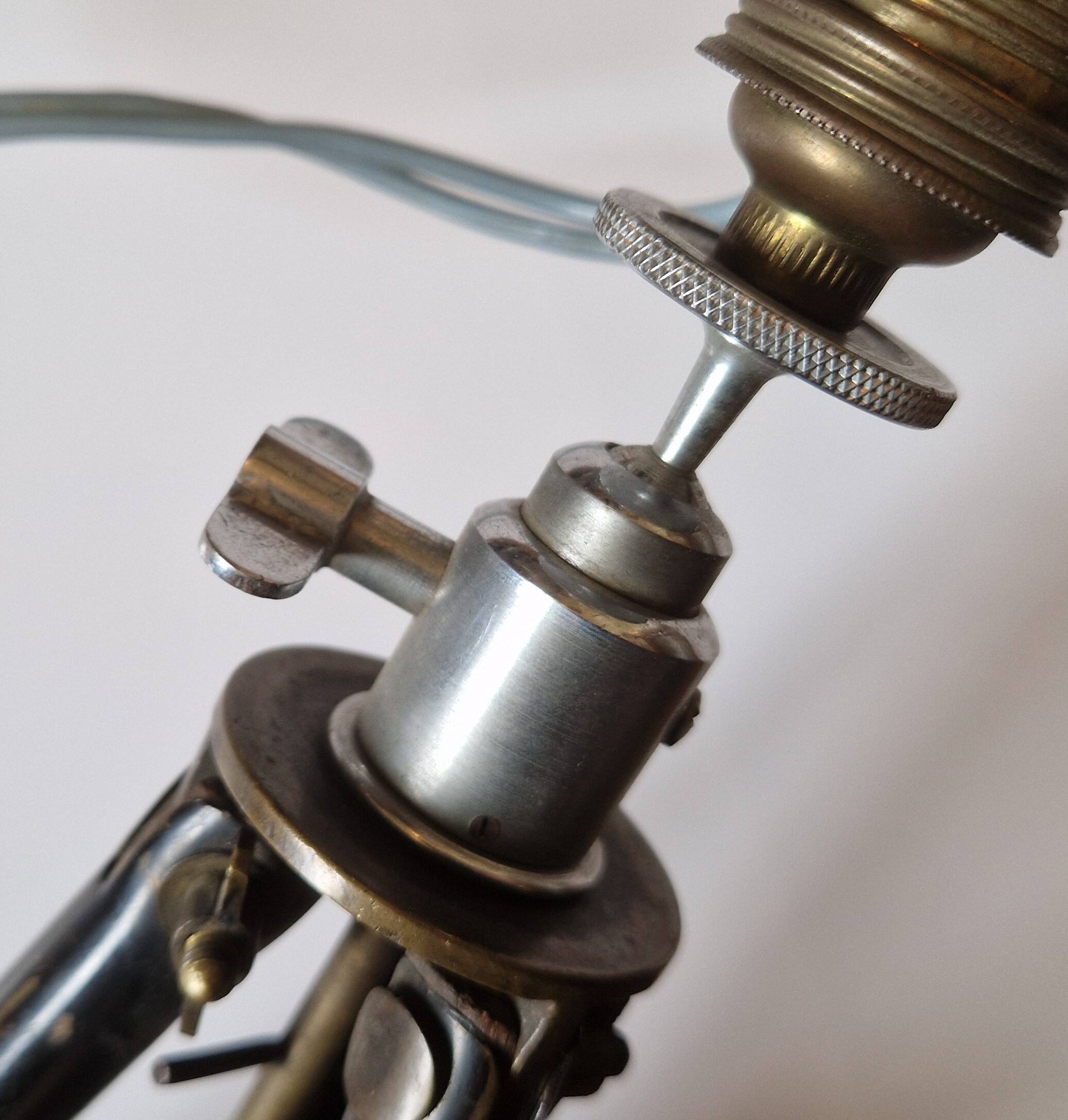 Lamp on old tripod, 1920s