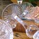 4 lead crystal wine glasses with slender baluster stems.