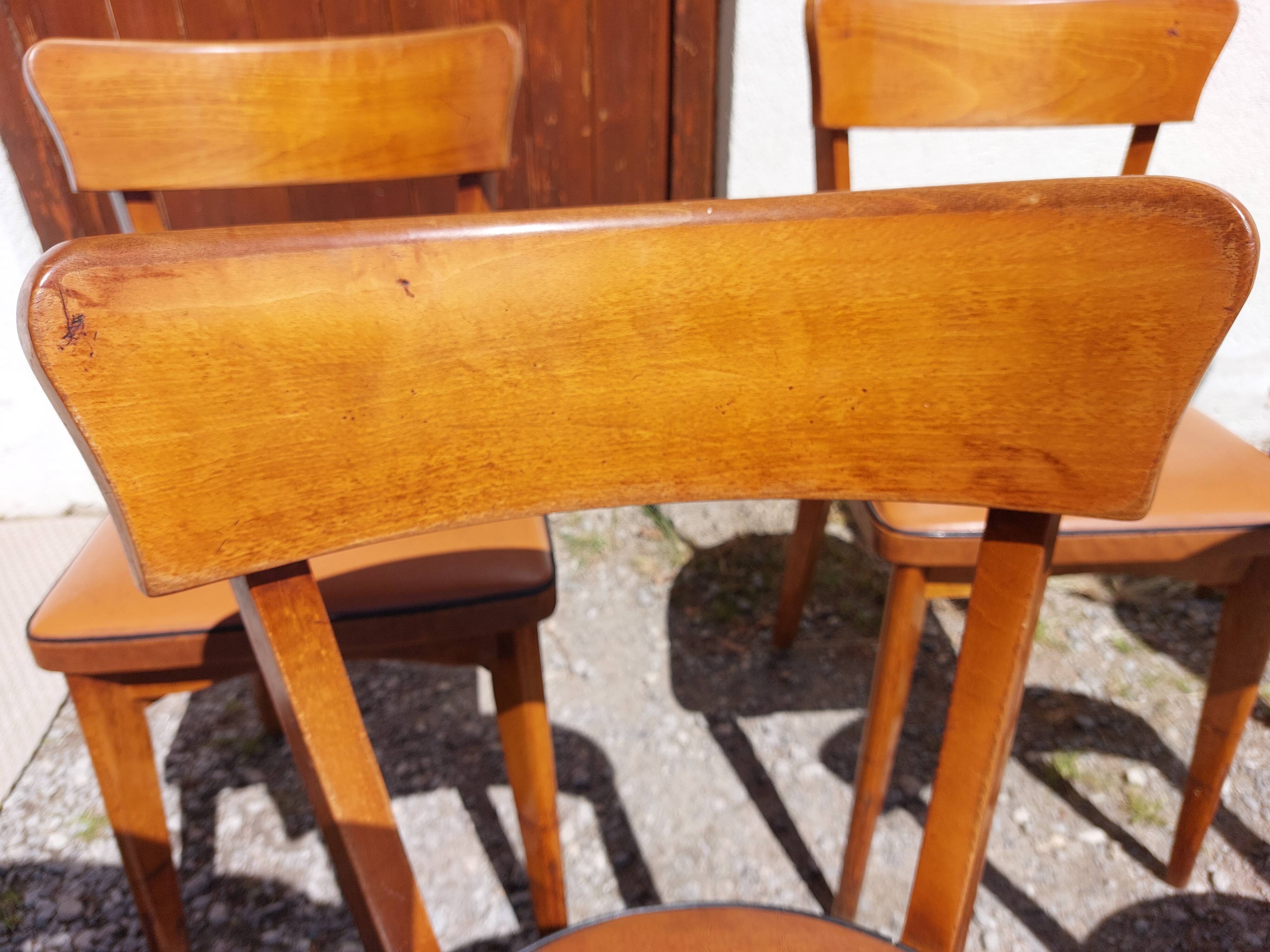 6 vintage 1960s wooden bistro chairs with camel faux leather.