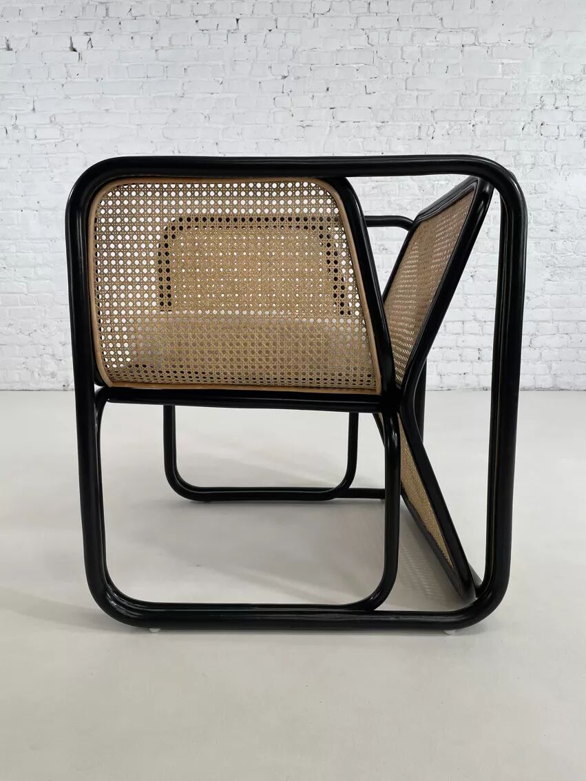 Cubic armchair in black rattan and canework