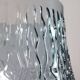 Vase vintage en verre pressé gris-bleu à décor ondulé