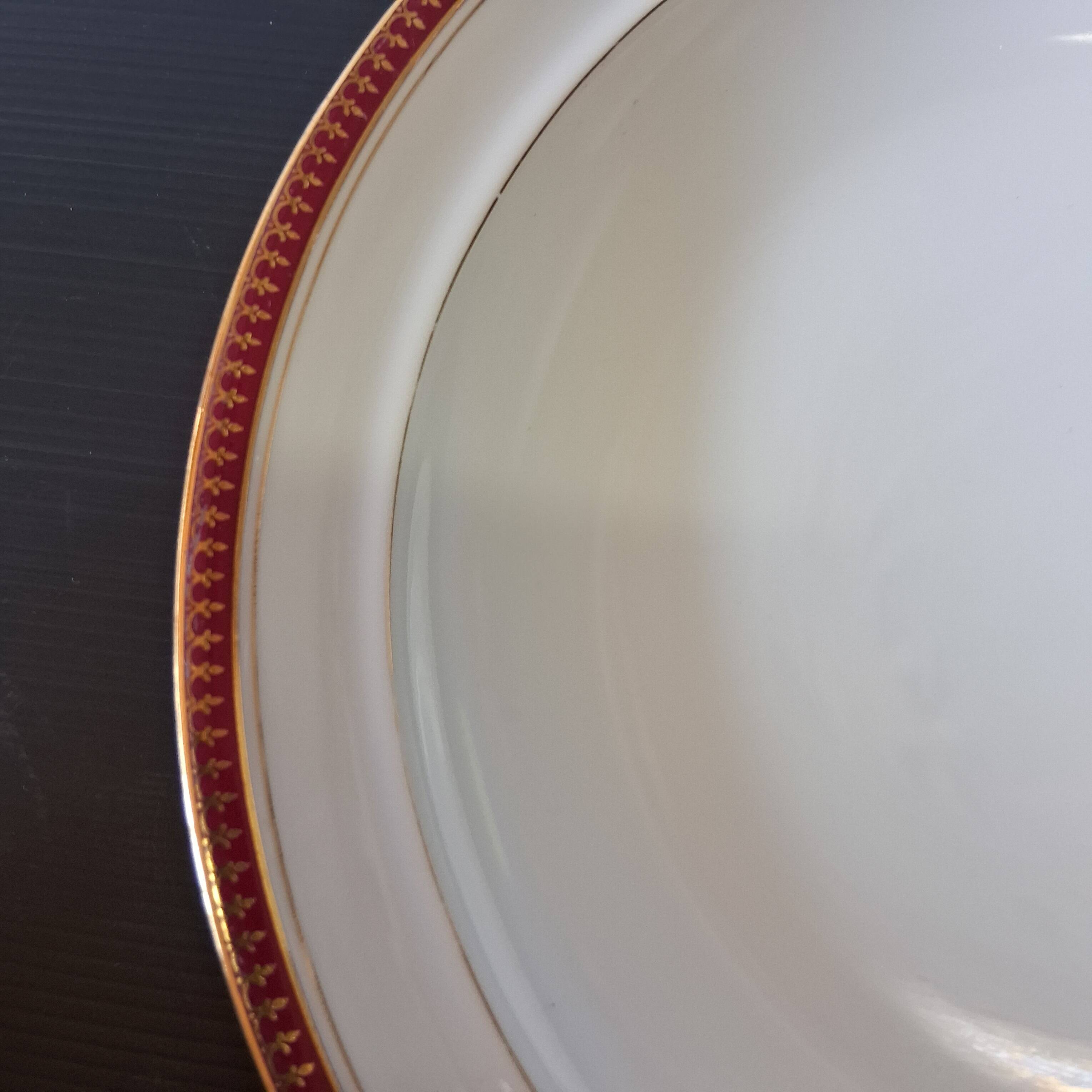 Round hollow serving plate in porcelain from Chastagner et Cie in good condition.