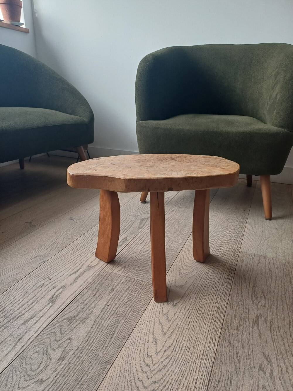 brutalist tripod stool in solid elm