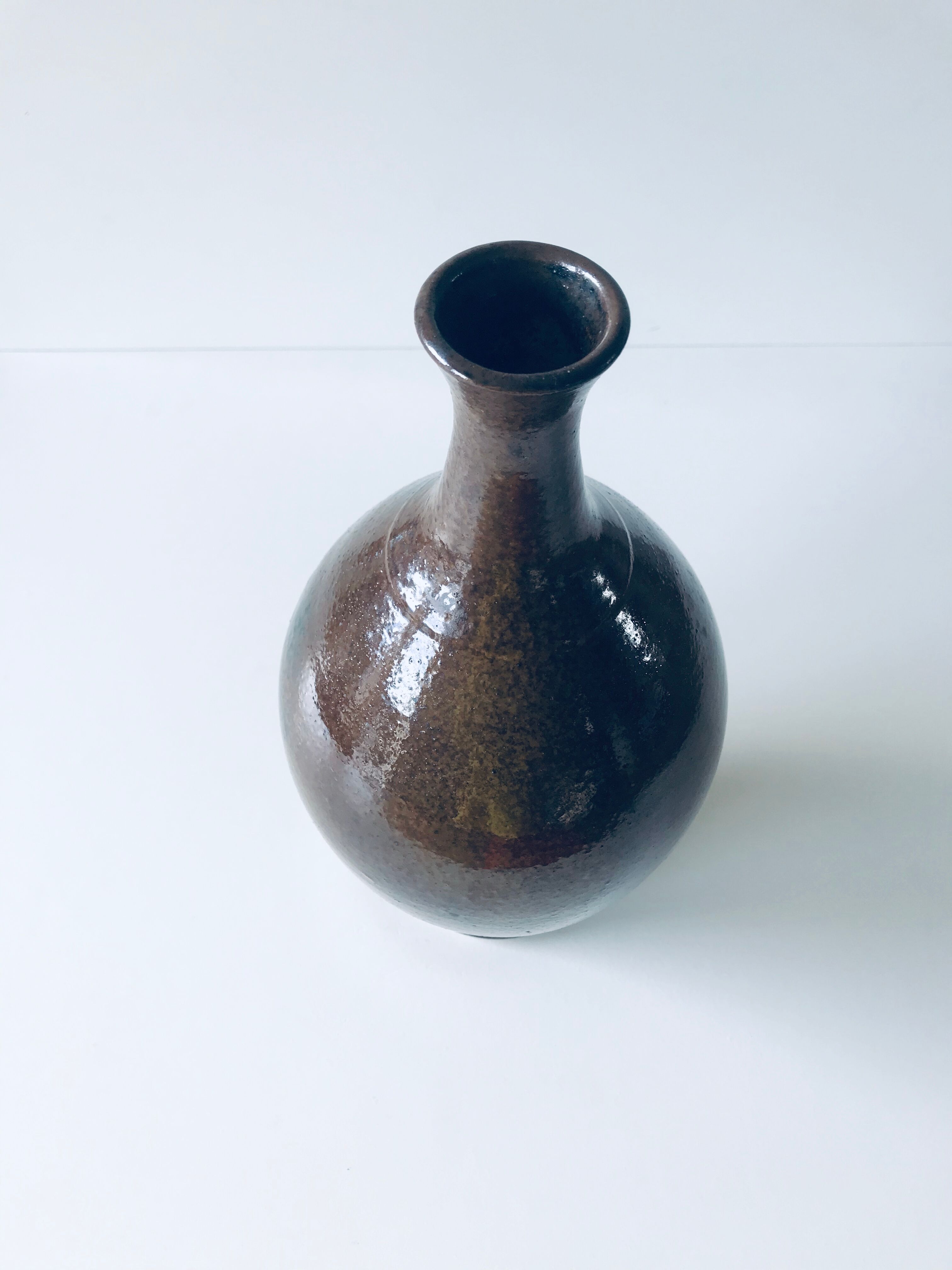 Enamelled sandstone vase