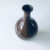 Enamelled sandstone vase