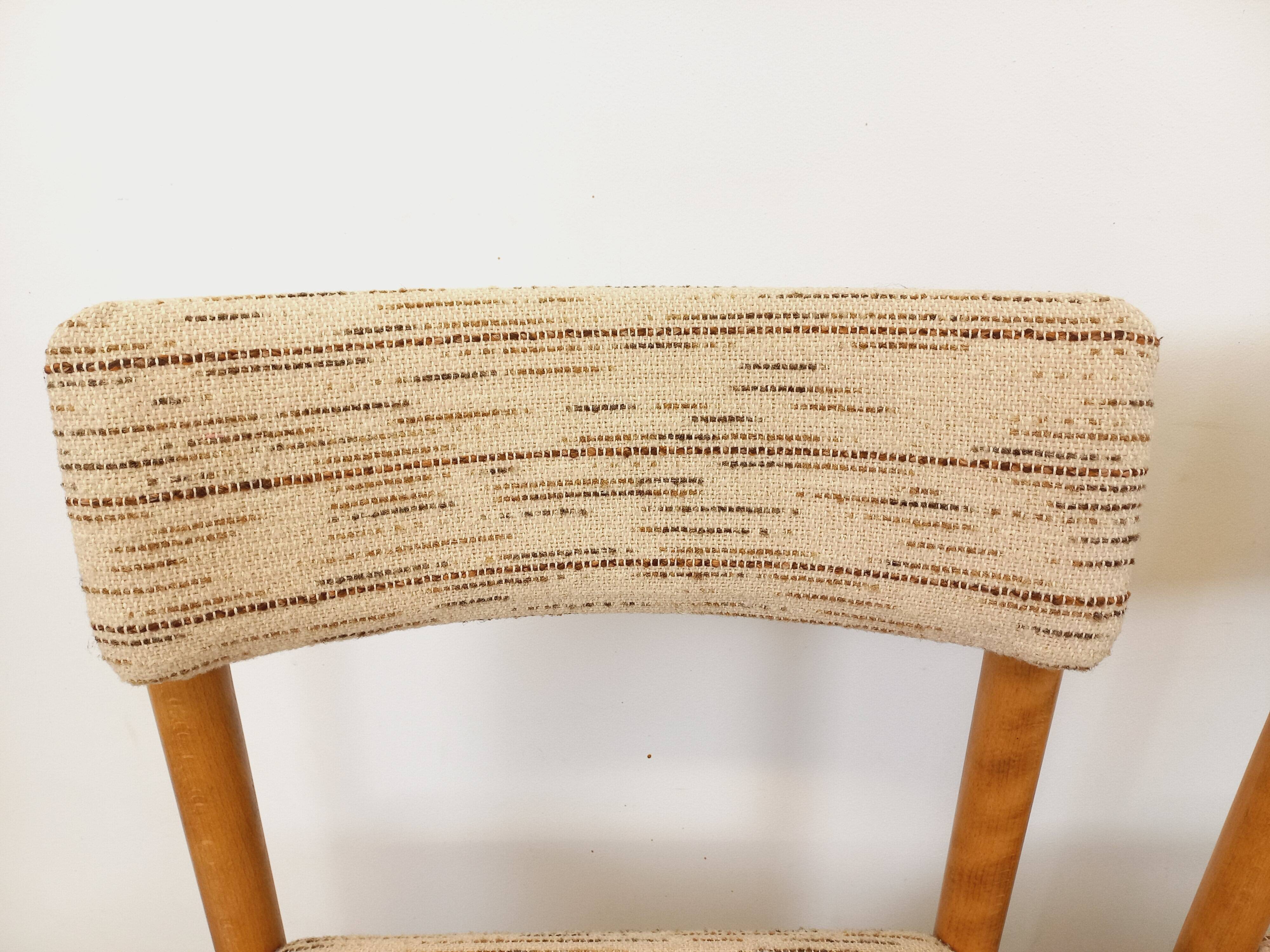 Pair of vintage Baumann chairs in wood and fabric from the 70s