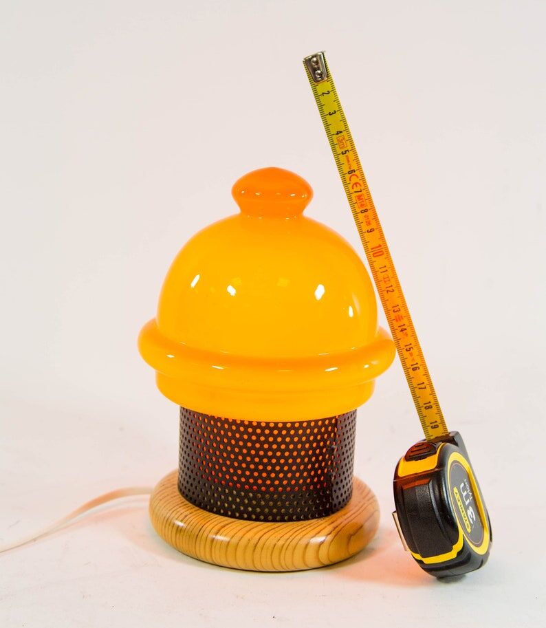 Vintage table lamp in orange glass and black perforated metal 70s