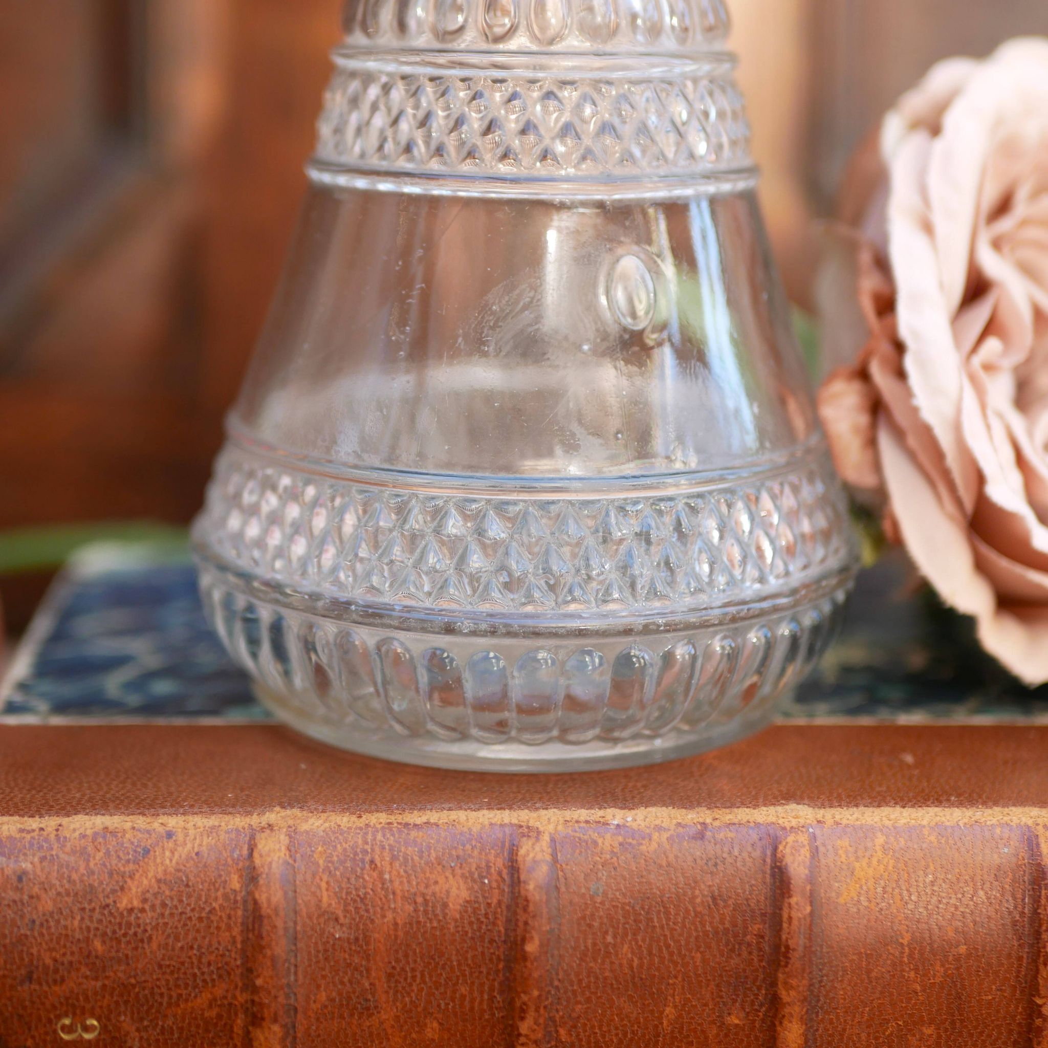 Cut glass liqueur decanter with decorated stopper