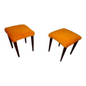 2 small yellow poufs