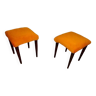 2 small yellow poufs