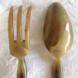 Old corn and silver salad cutlery
