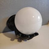Black ceramic handand white opaline ball sconce