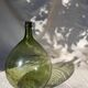 Large French green glass demijohn