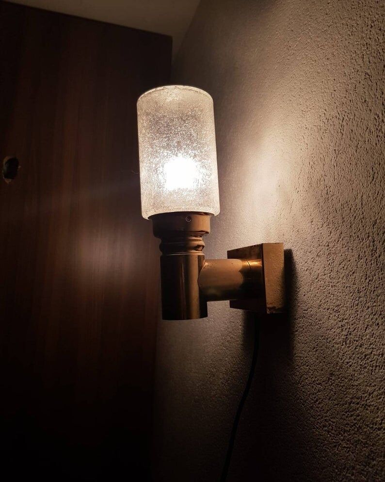 Brass applique with 1970 glass lampshade