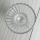 Antique thick glass vase on a pedestal.