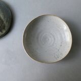 2 enameled stoneware cups, one of which is signed