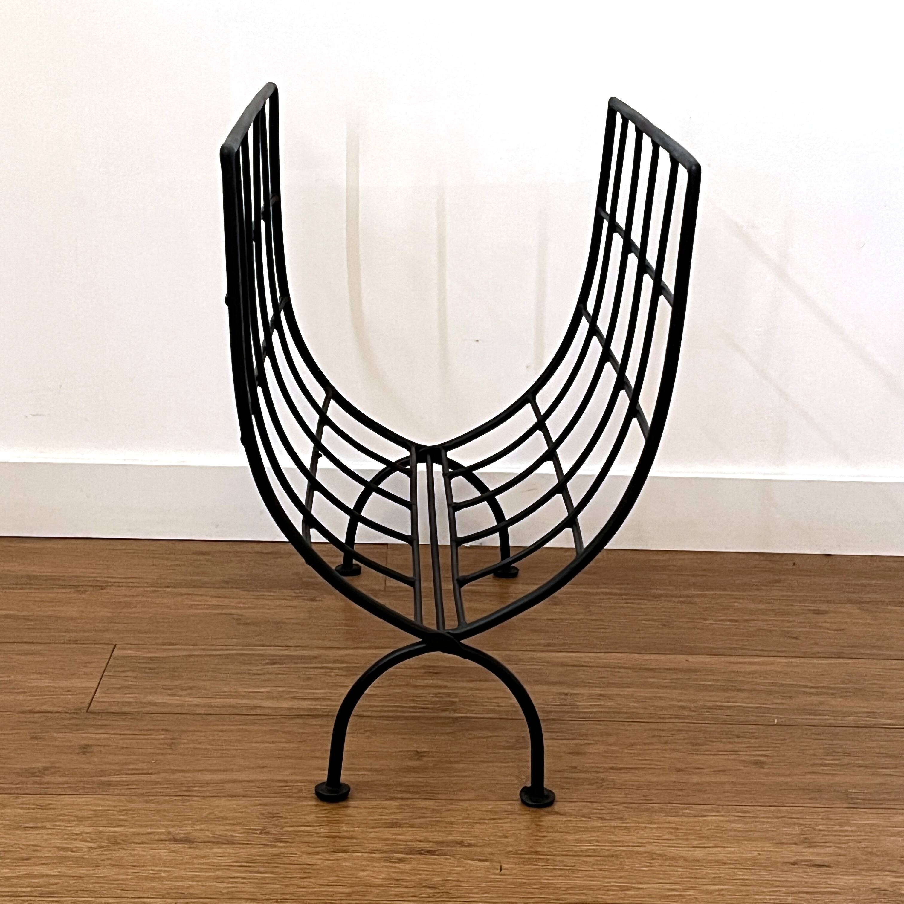 Black metal magazine rack