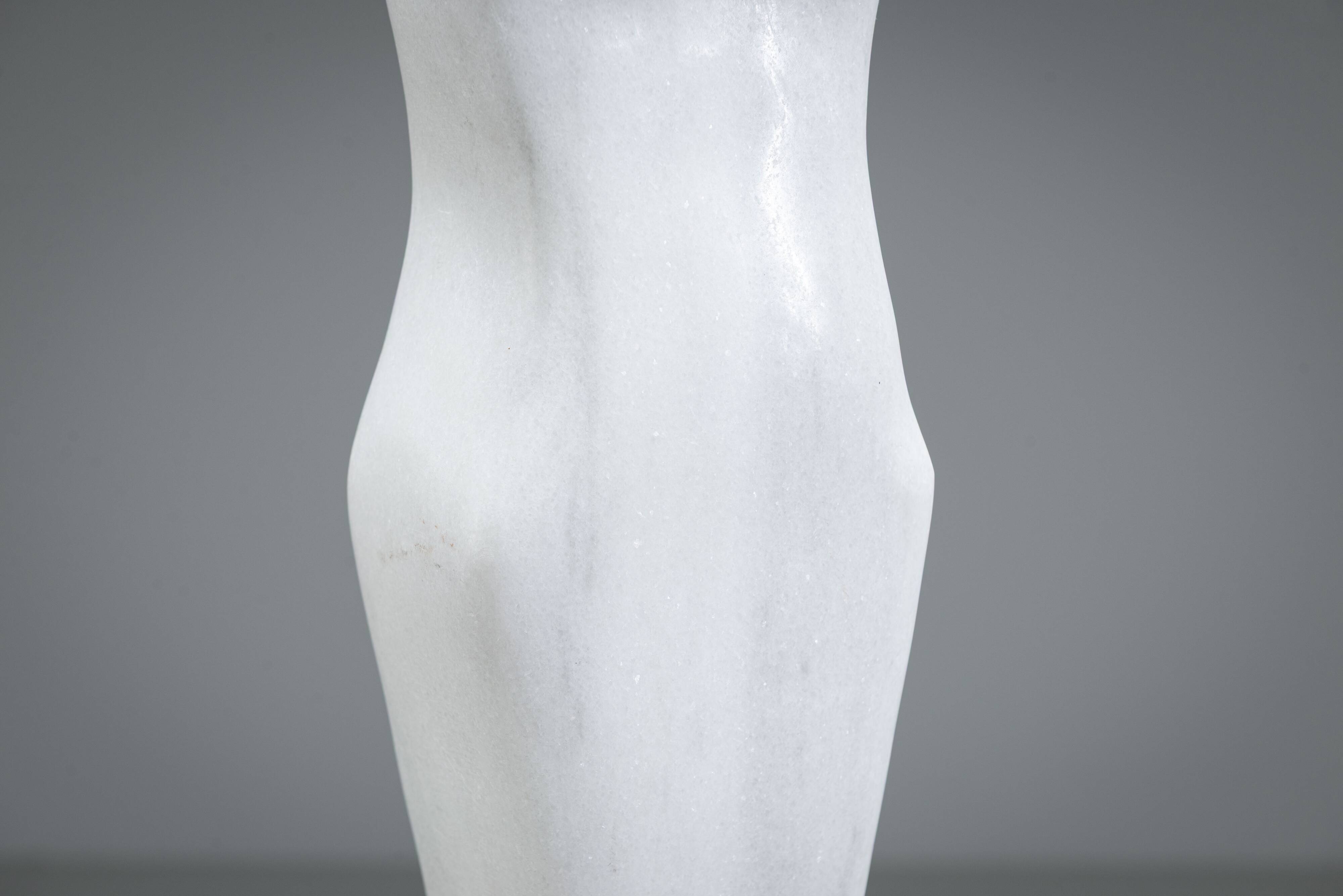 Abstract solid white marble torso