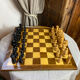 Chess set with wooden board and pieces