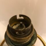 Brass lamp with removable ring around a globe