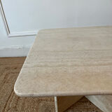 Square coffee table in travertine.