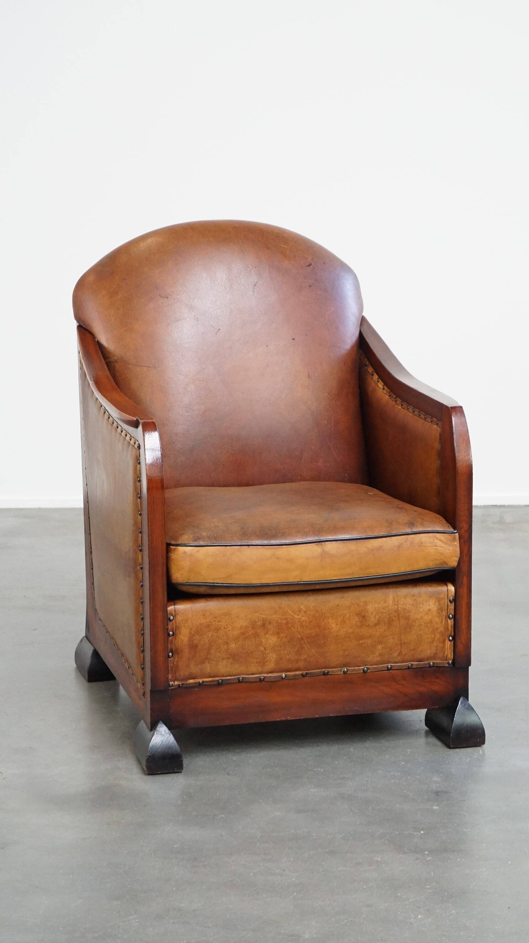 Unique, stately, comfortable sheepskin Art Deco design armchair