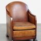 Unique, stately, comfortable sheepskin Art Deco design armchair