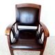 Colonial style wooden armchair