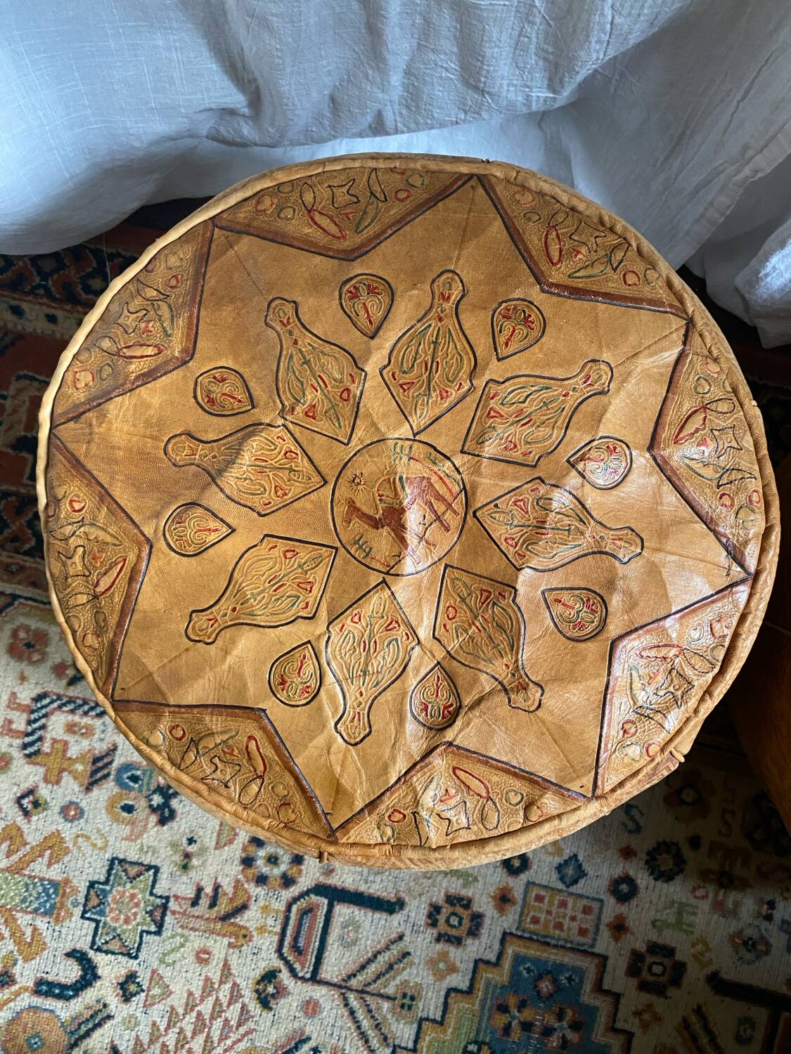 Pair of leather poufs