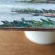Riverside landscape painting (signed Chevalier)