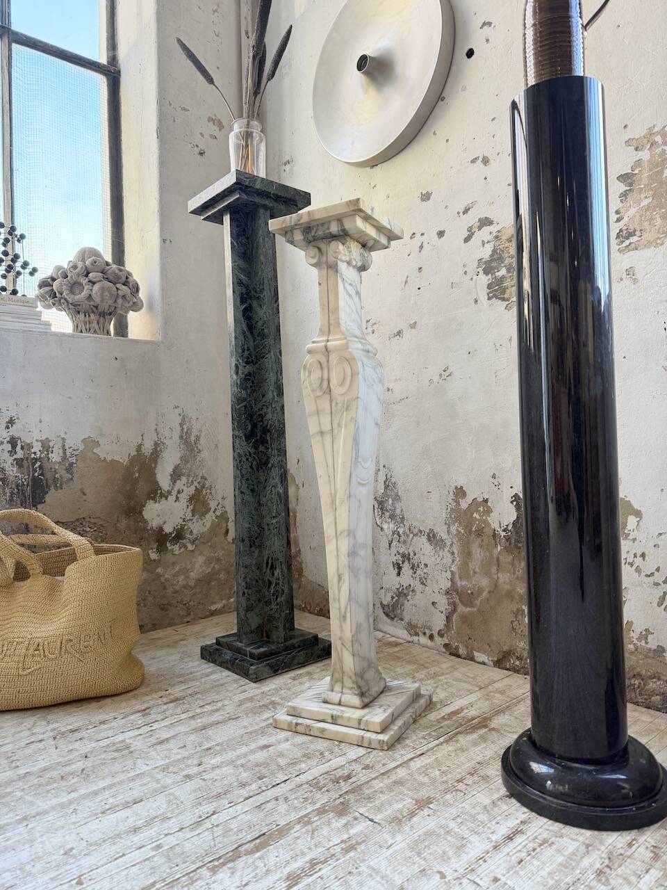Set of 4 marble columns or pedestals.