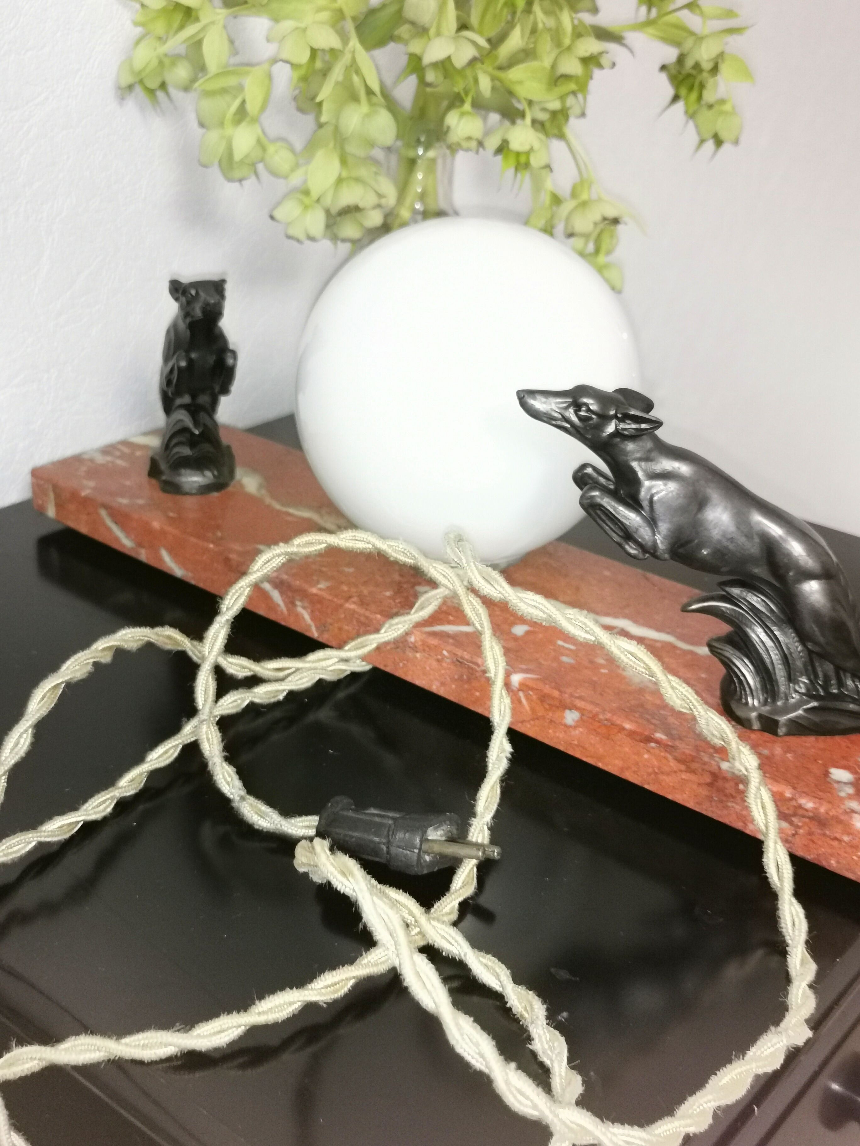 Art deco lamp, marble, globe, opaline and greyhounds in regulation, 1930